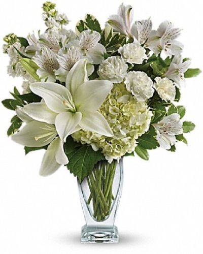 <p>This bouquet features a blend of pure white hydrangea, Asiatic lilies, alstroemeria, miniature carnations, and stock. Each stem is thoughtfully arranged in a sleek, modern vase that complements the arrangement's refined silhouette and understated beauty.</p>