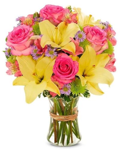 <p>This bouquet showcases a lively mix of sunny yellow blooms, radiant pink roses, and petite accent flowers in a playful blend of complementary colors. Pops of orange, lavender, or purple bring added depth and contrast, while the classic glass vase keeps the look polished and timeless.</p>