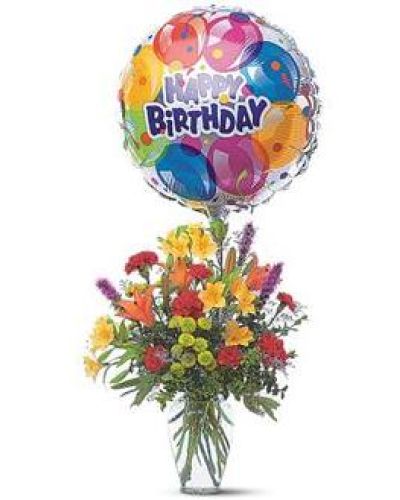 <p>Take their special day to new heights with a vibrant bouquet paired with a cheerful foil balloon. This delightful bouquet features a mix of alstroemeria, carnations, chrysanthemums, and lilies, all arranged in a classic clear glass vase.</p>