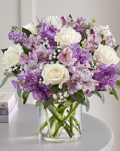 <p>Lovely memories are made with thoughtful gifts for the ones we care about. Hand-designed inside a clear cylinder vase with cascading greenery all around, it’s a wonderful way to express the sentiments you have inside your heart.</p>