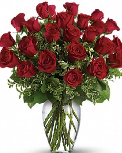 <p>Bold, beautiful, and full of meaning, this arrangement of premium red roses serves as a powerful symbol of passion, devotion, and enduring romance. Each bouquet features a dozen long-stem red roses, elegantly arranged with fresh greenery in a classic glass vase.</p>